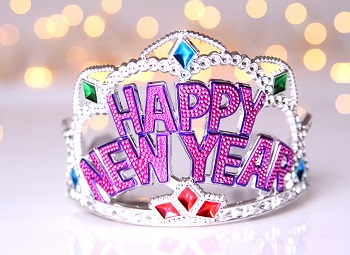 plastic tiara that reads happy new year